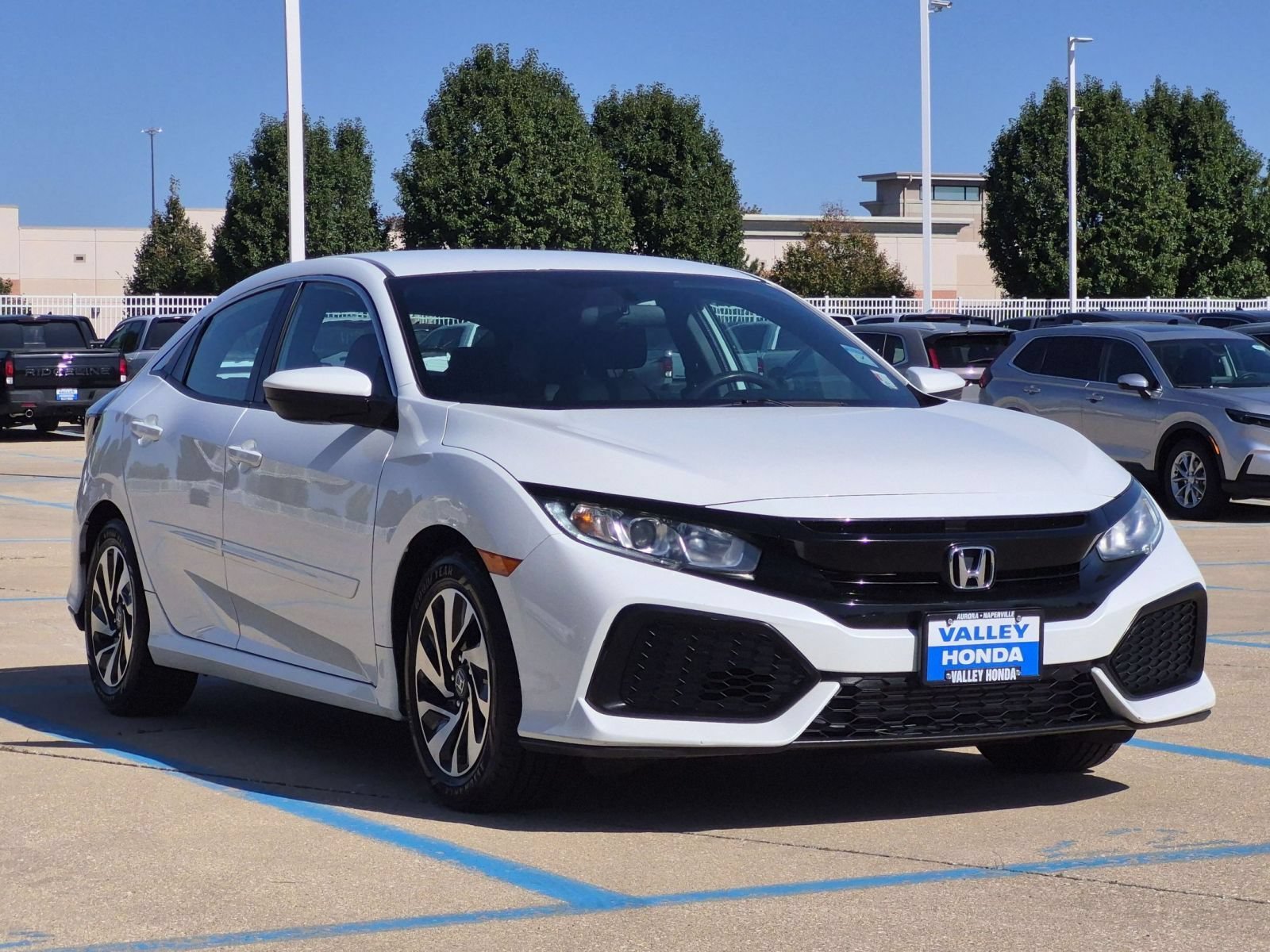 Used 2017 White Orchid Pearl Honda LX Hatchback image 4