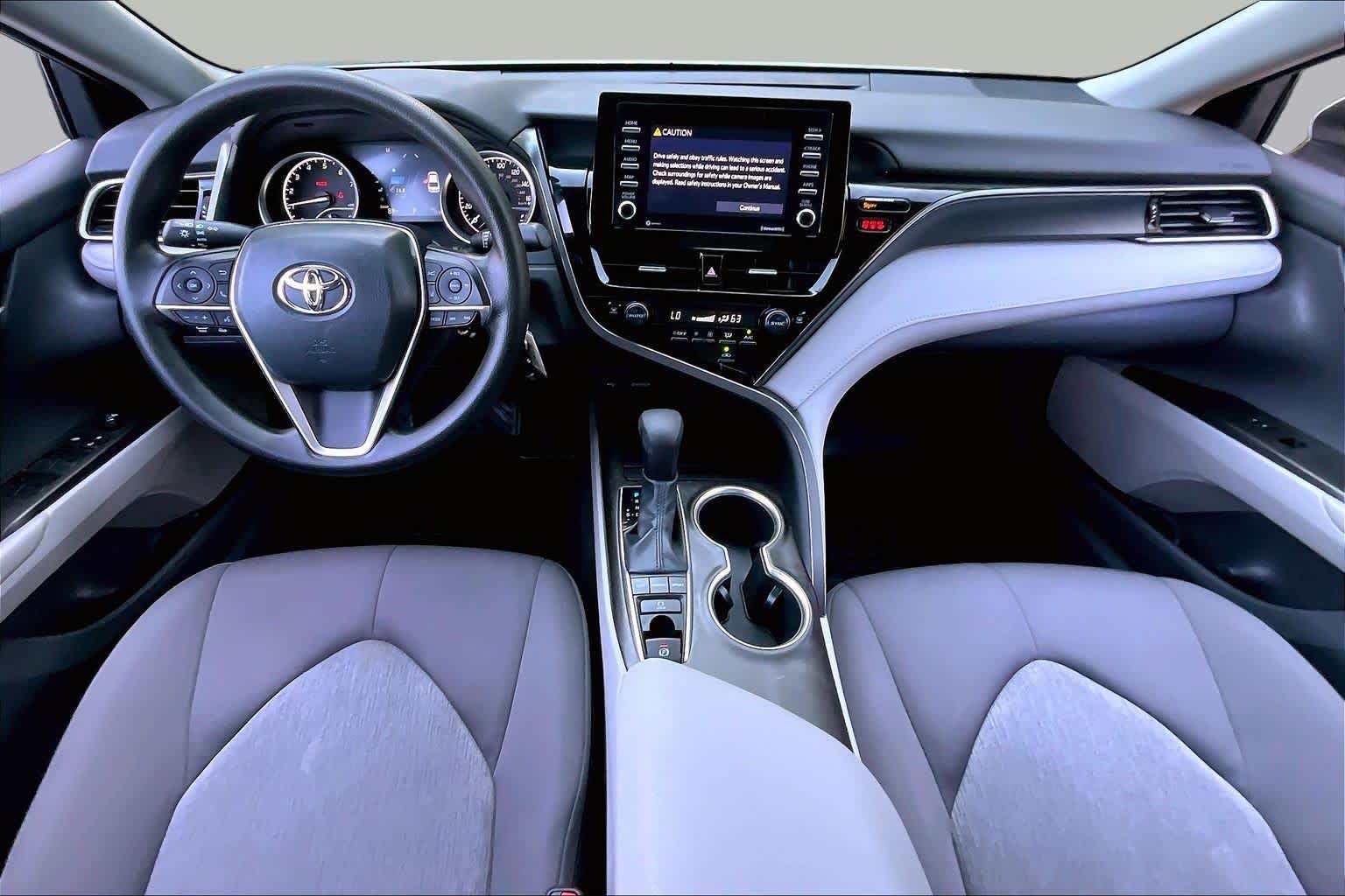 Used 2023 Celestial Silver Metallic Toyota LE image 14