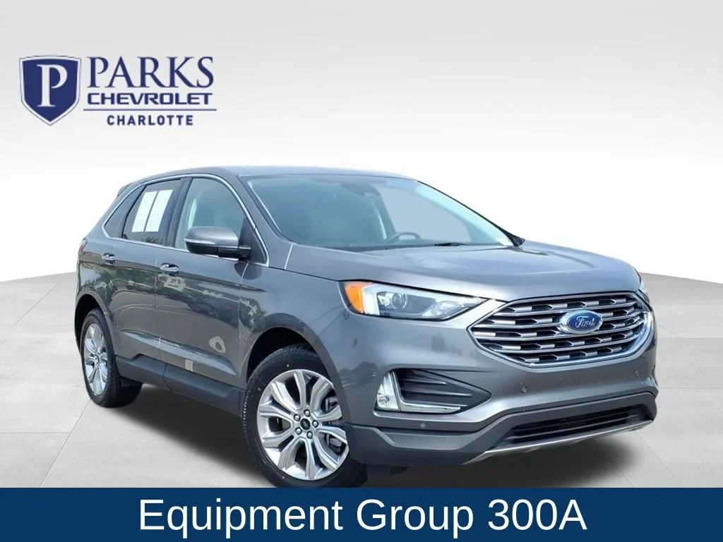Used 2024 Carbonized Gray Ford Titanium image 1