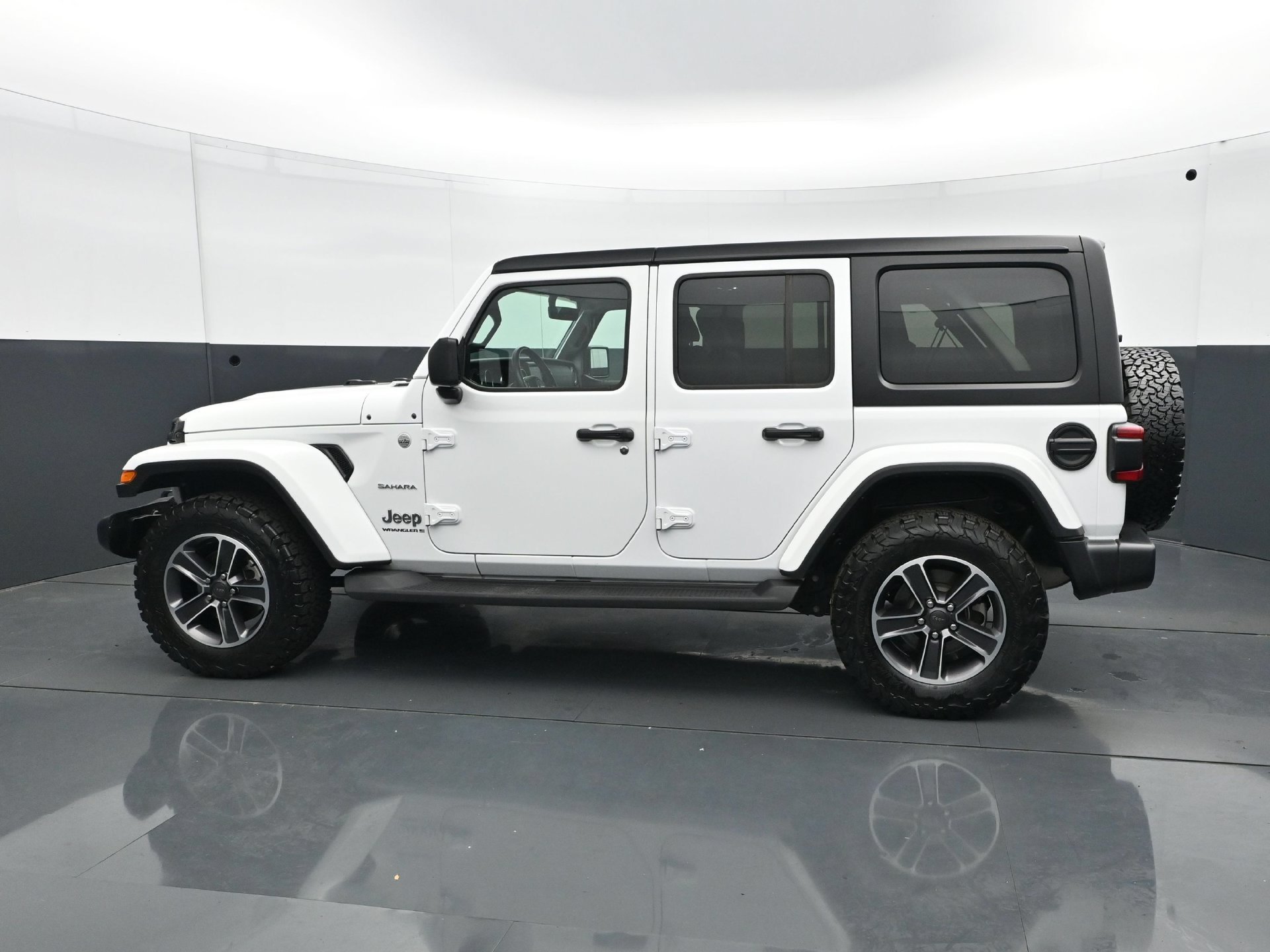 Used 2023 Jeep Wrangler 4-Door Sahara with VIN 1C4HJXEG6PW681898 for sale in Minneapolis, Minnesota