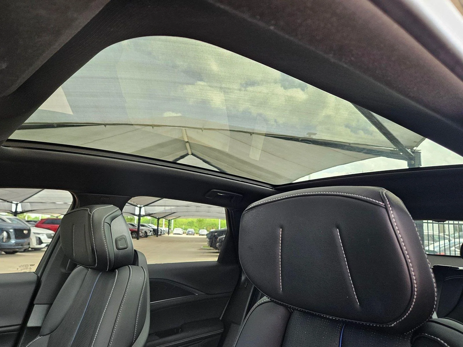 New 2026 Stellar Black Metallic Cadillac Sport image 8