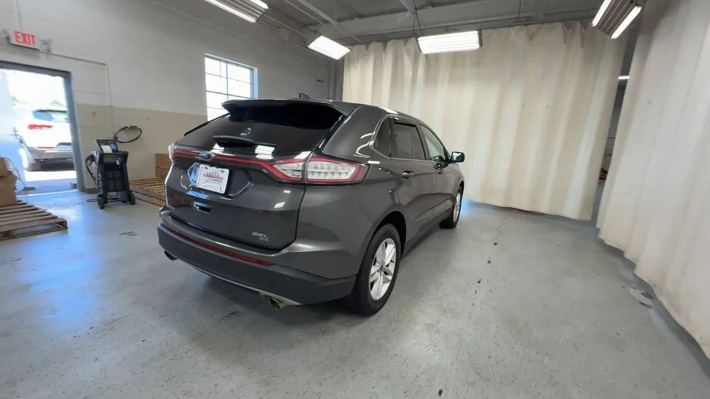 Used 2015 Magnetic Metallic Ford SEL image 10
