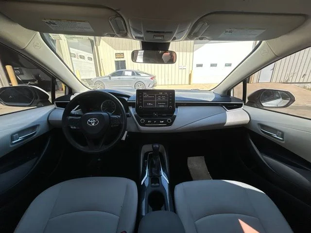 Used 2021 Super White Toyota LE image 17