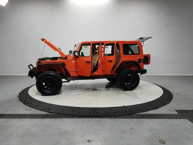 Used 2018 Orange Jeep Unlimited Sahara image 12