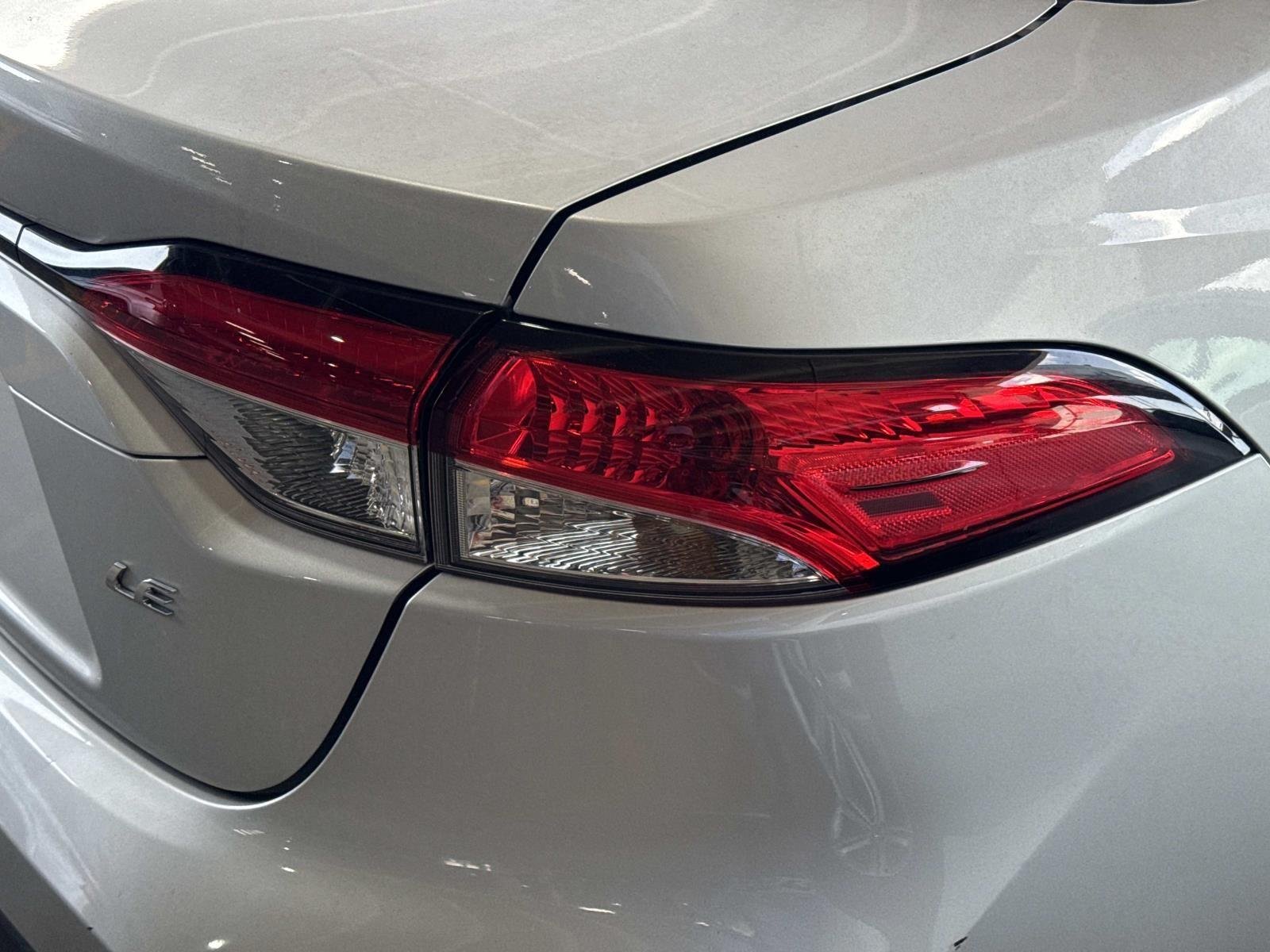 Used 2024 Classic Silver Metallic Toyota LE image 13