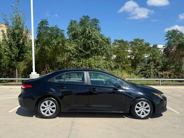 Used 2025 Midnight Black Metallic Toyota LE image 4