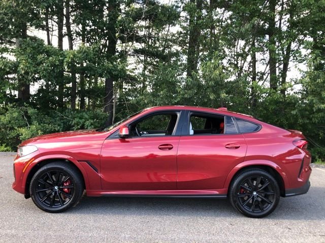 Used 2023 Flamenco Red Metallic BMW xDrive40i image 7