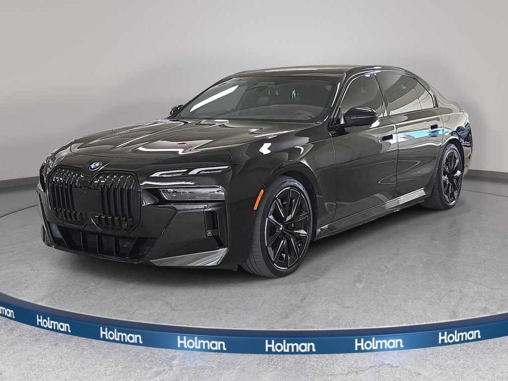 Used 2023 Black Sapphire Metallic BMW xDrive60 image 1