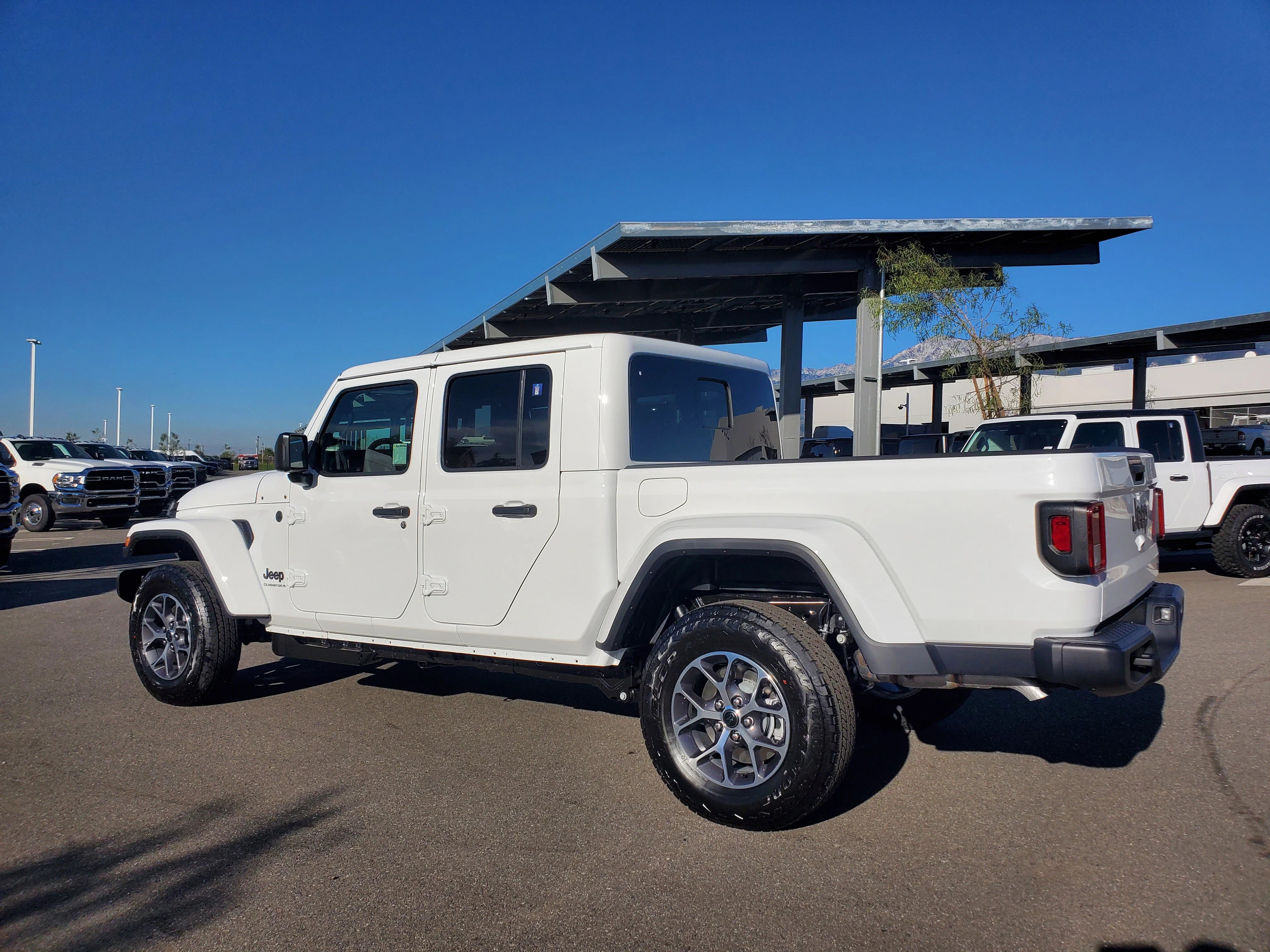 New 2026 Bright White Clear-Coat Exterior Paint Jeep Sport S image 3