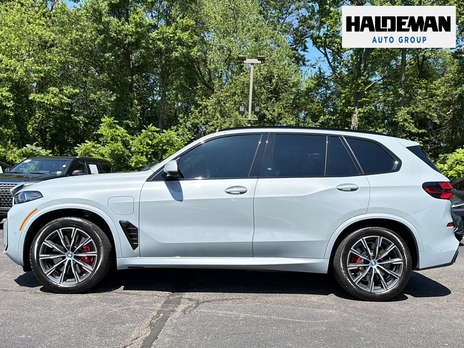 Used 2025 Brooklyn Gray Metallic BMW xDrive50e image 7