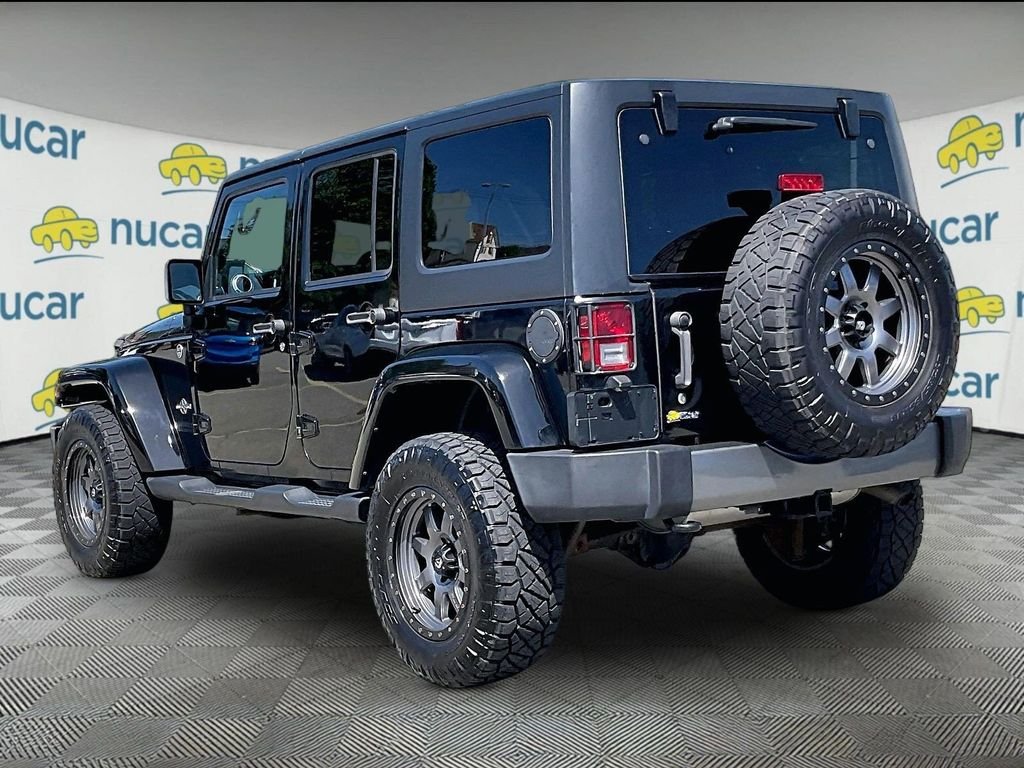 Used 2015 Black Jeep Unlimited Freedom Edition image 4