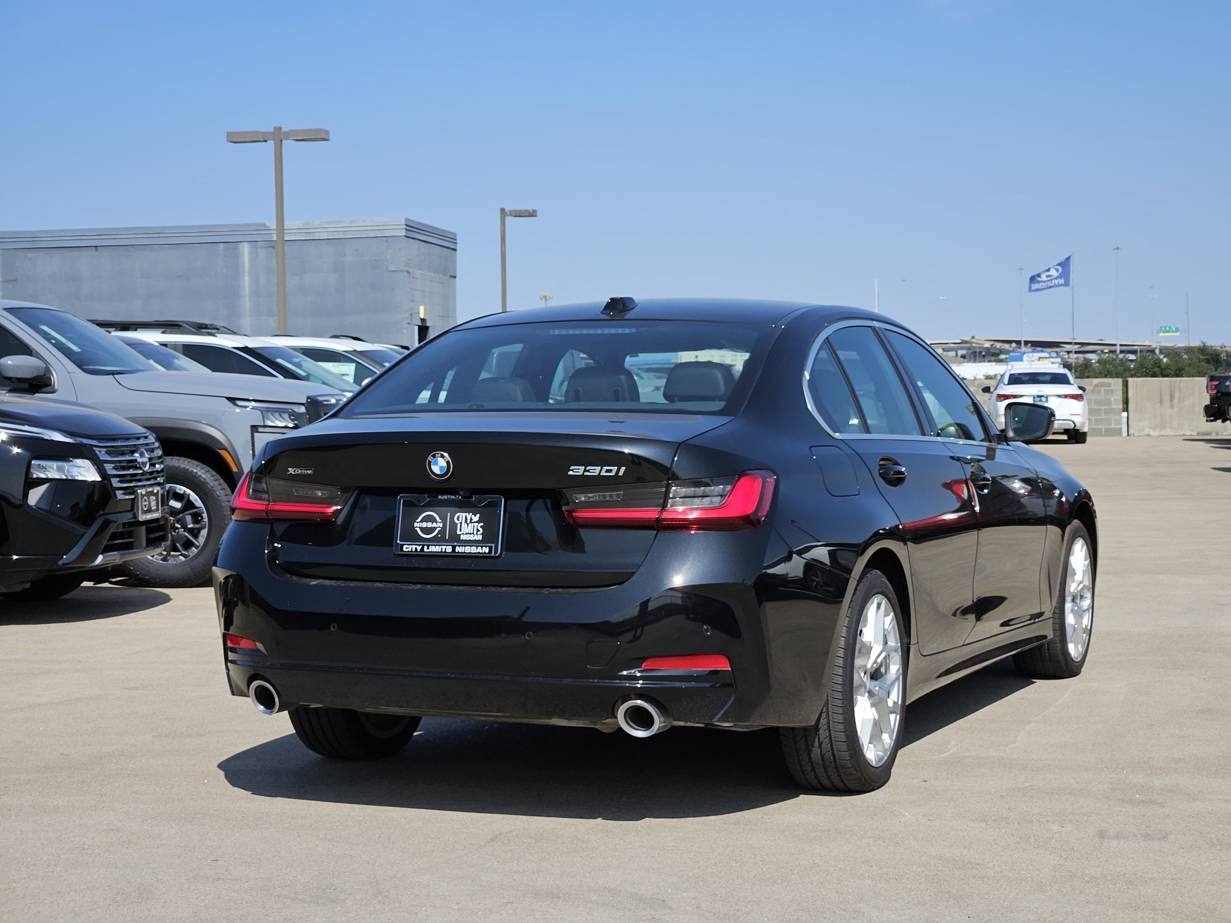 Used 2025 BLACK BMW 330i xDrive image 3