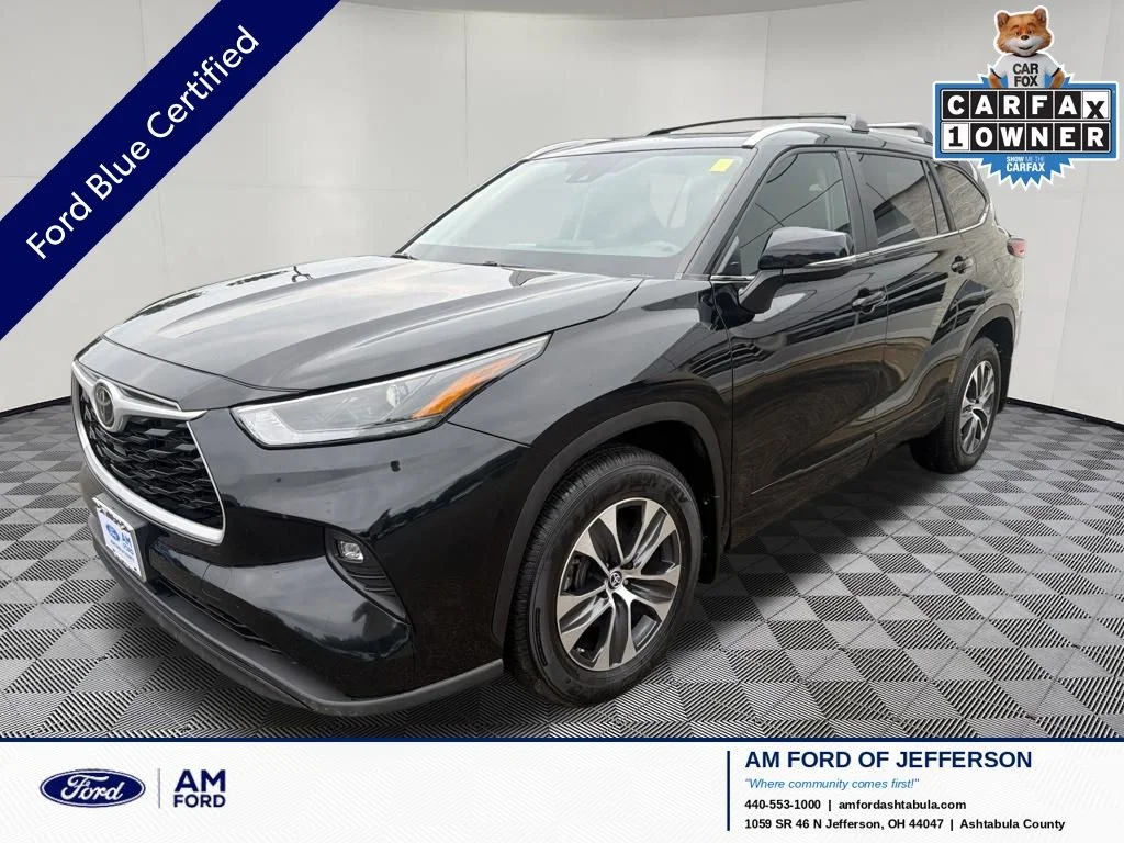Used 2023 Midnight Black Metallic Toyota XLE image 1