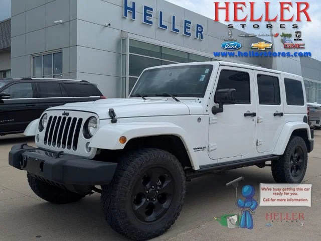 Used 2015 Bright White Clearcoat Jeep Sahara image 1