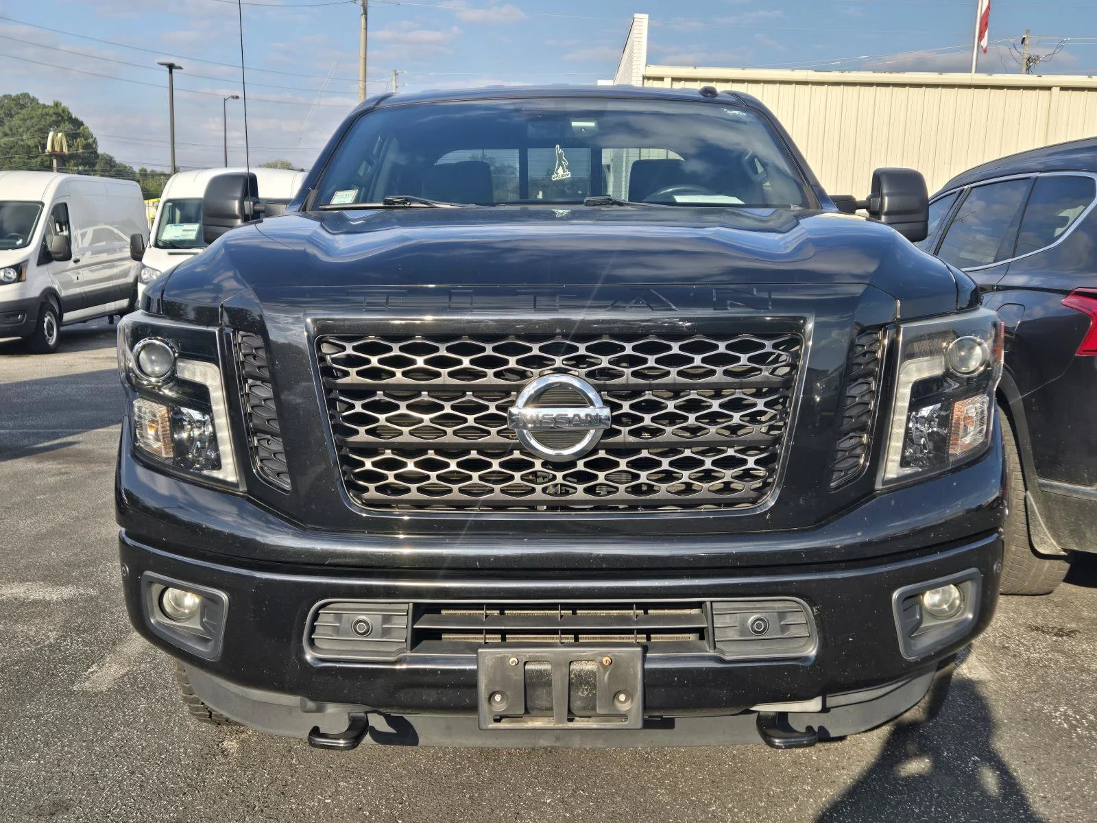 Used 2018 Magnetic Black Nissan SV image 2