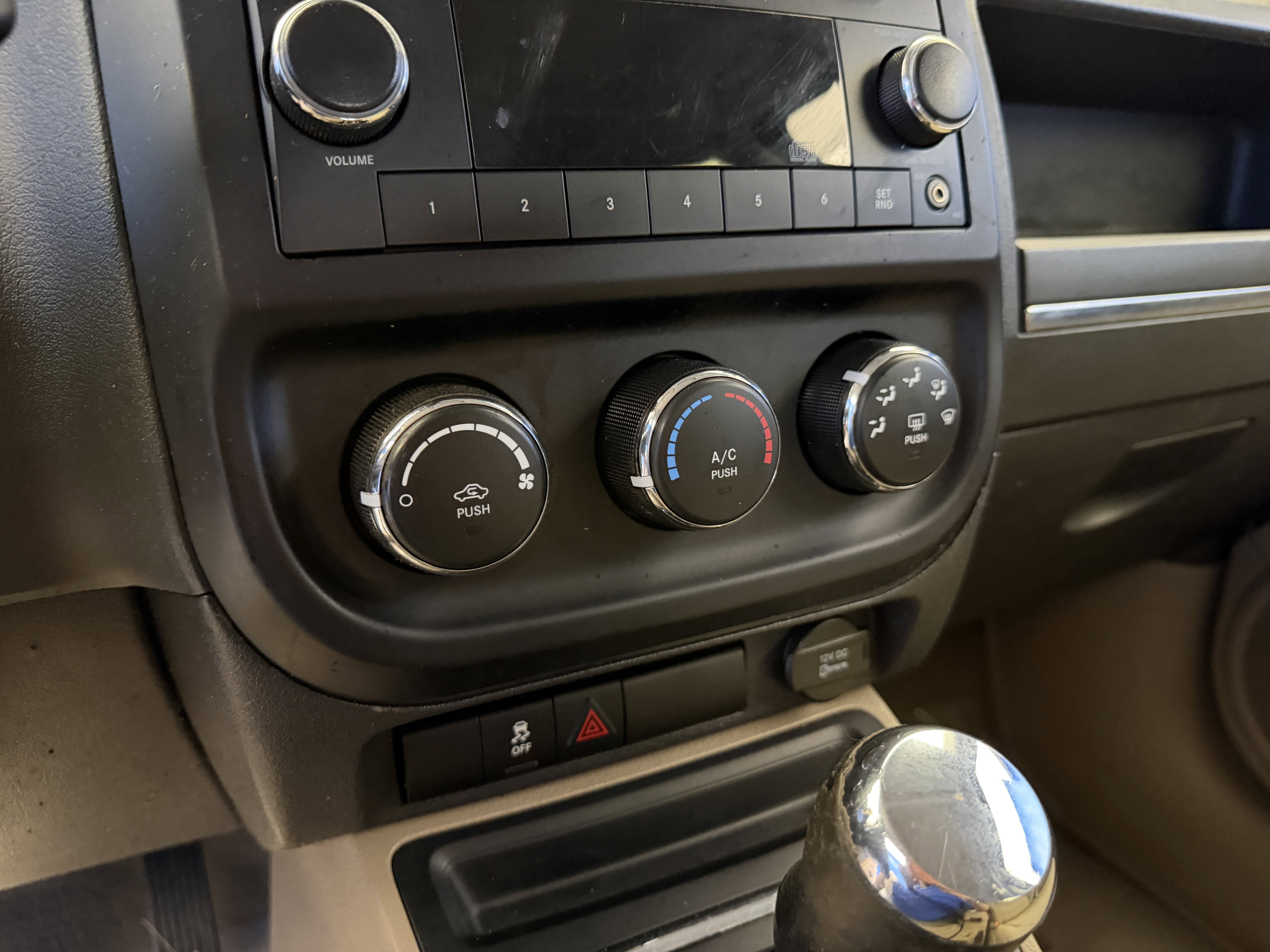 Used 2012 Mineral Gray Metallic Jeep Sport image 17