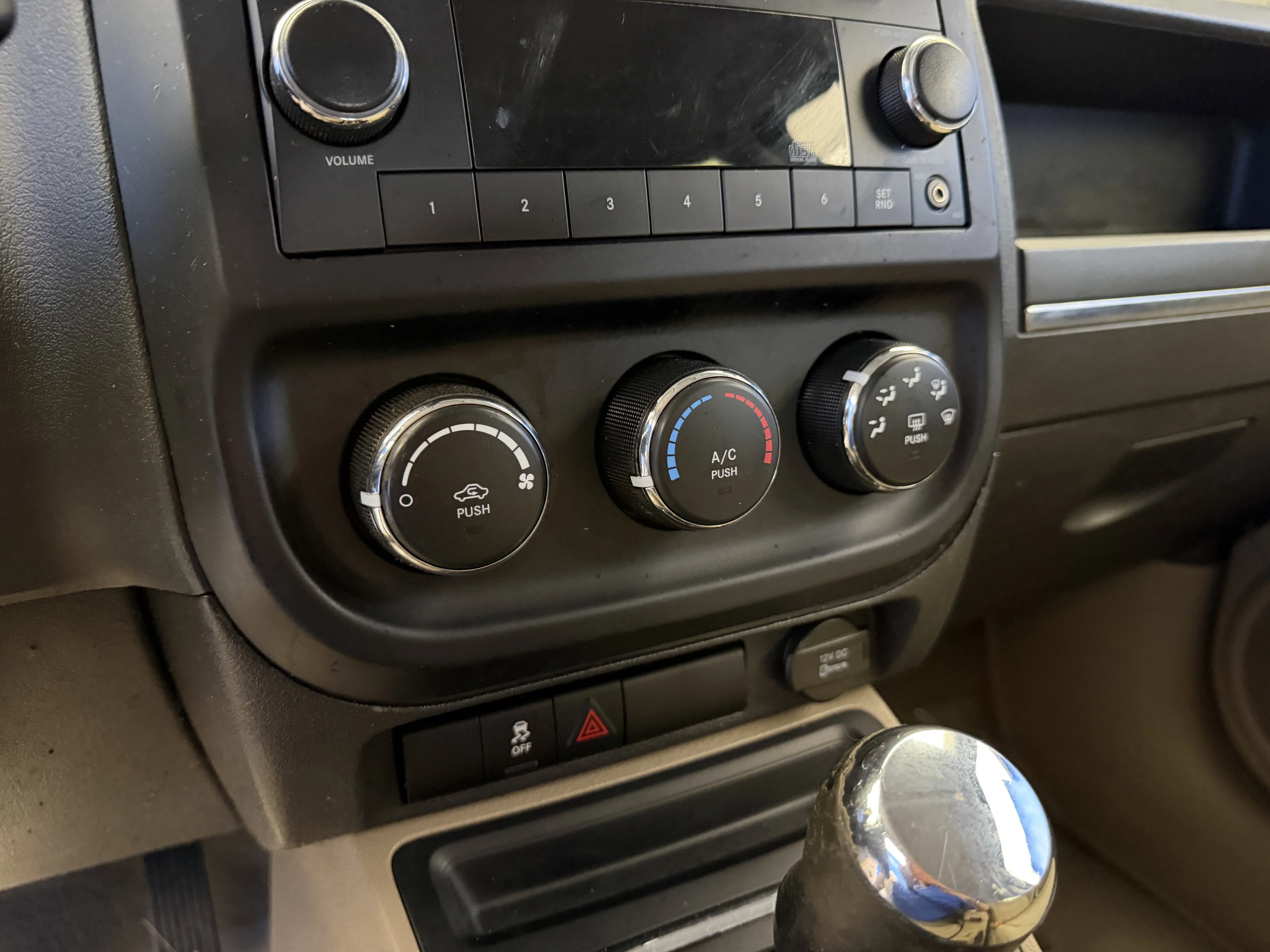 Used 2012 Mineral Gray Metallic Jeep Sport image 17