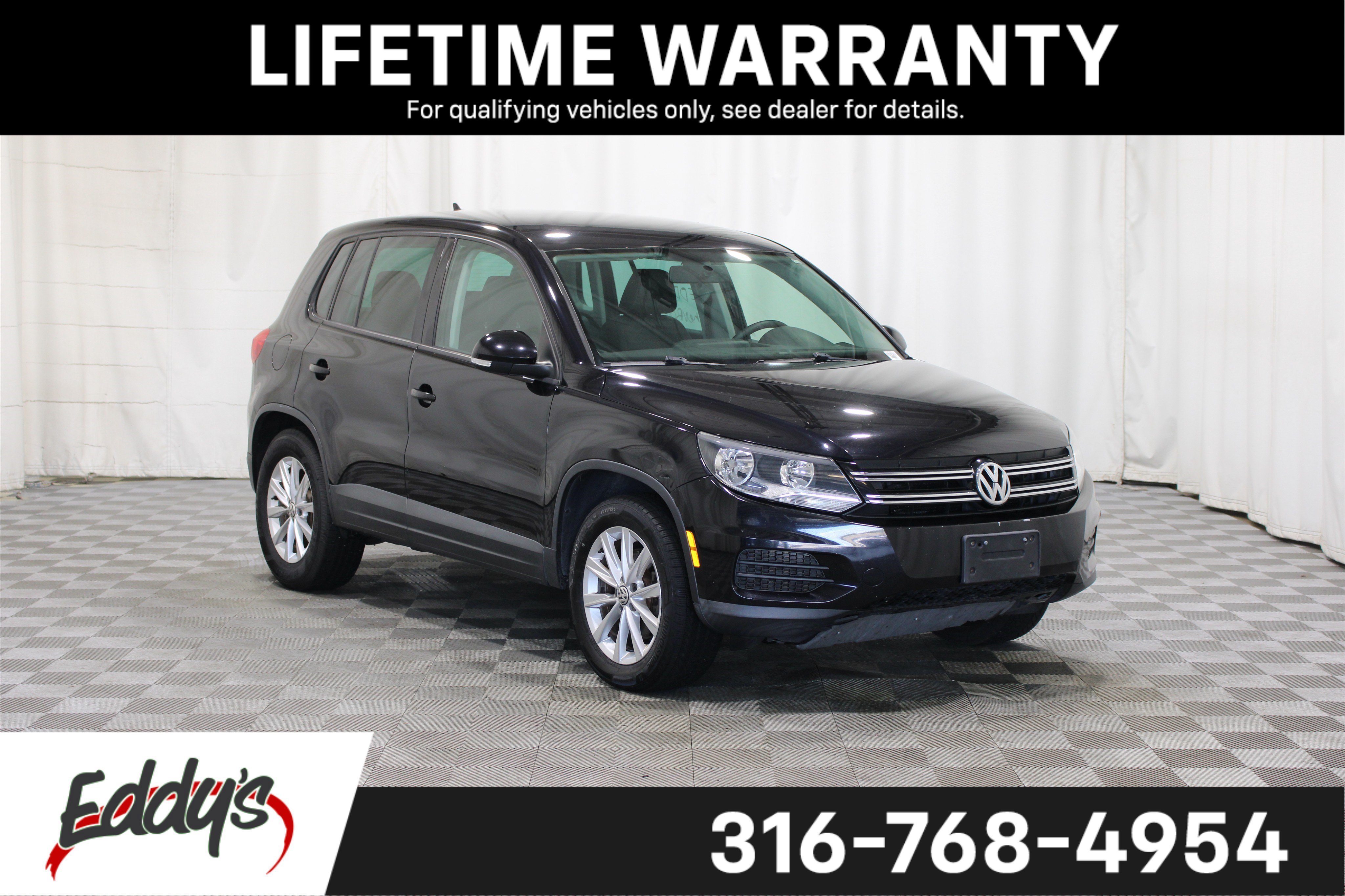 Used 2014 Deep Black Pearl Volkswagen SE image 1