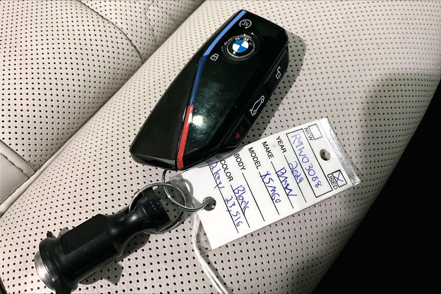 Certified Used 2024 Black Sapphire Metallic BMW M60i image 14