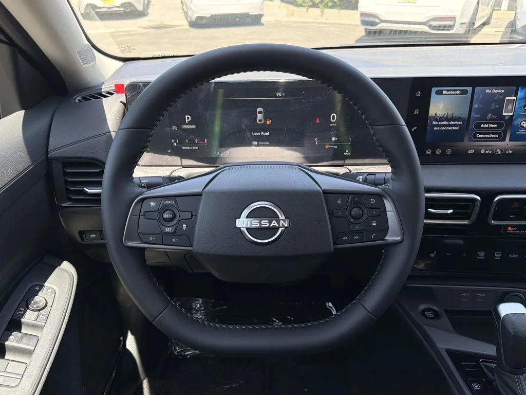 New 2026 Gun Metallic Nissan SV image 7
