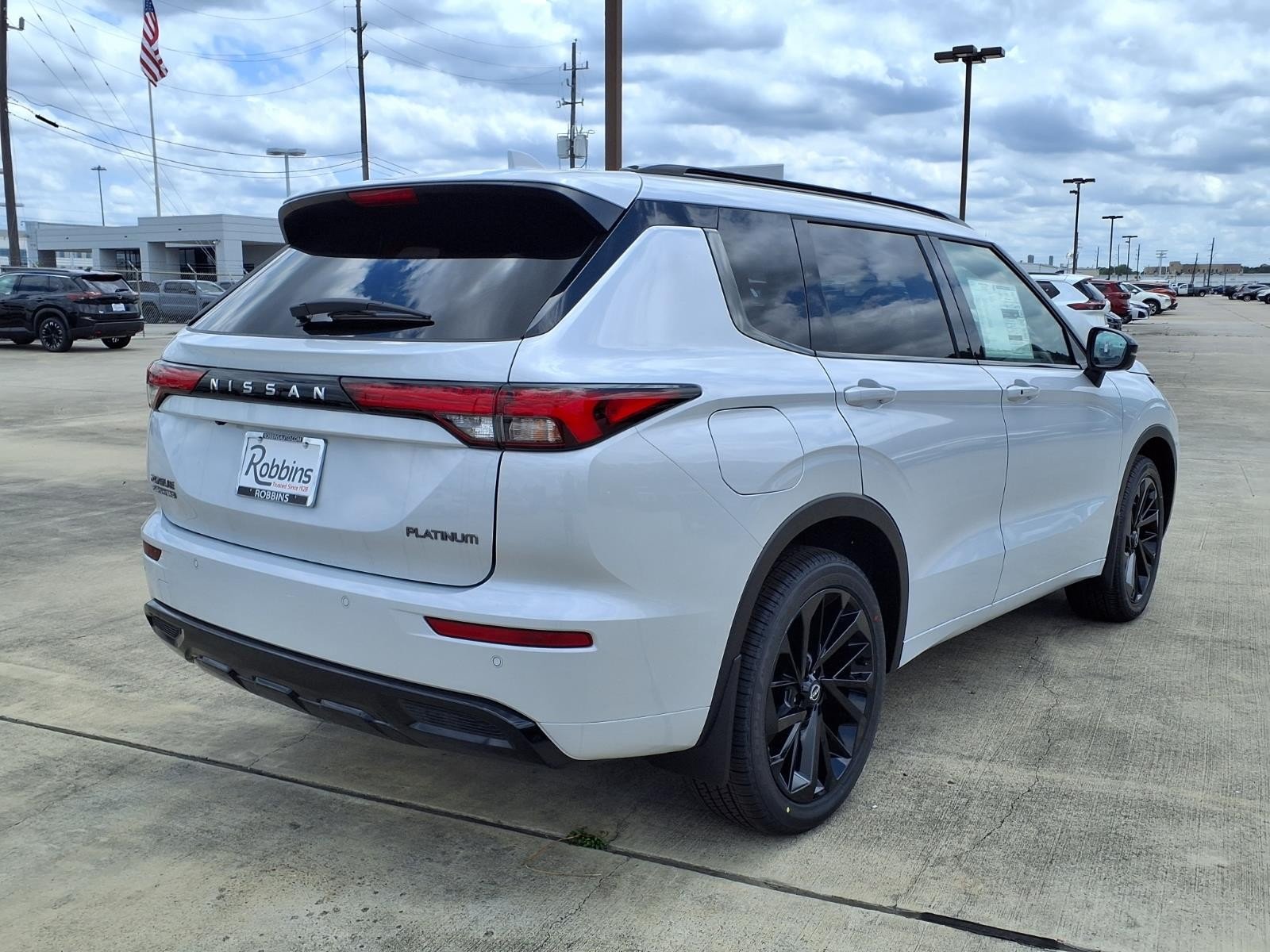 2026 Nissan Rogue Plug-In Hybrid Platinum White at Sterling McCall Nissan