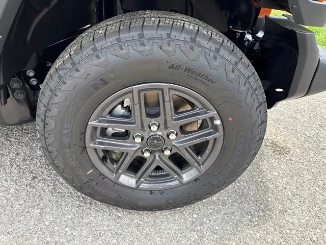 New 2026 Orange Jeep Sport image 13