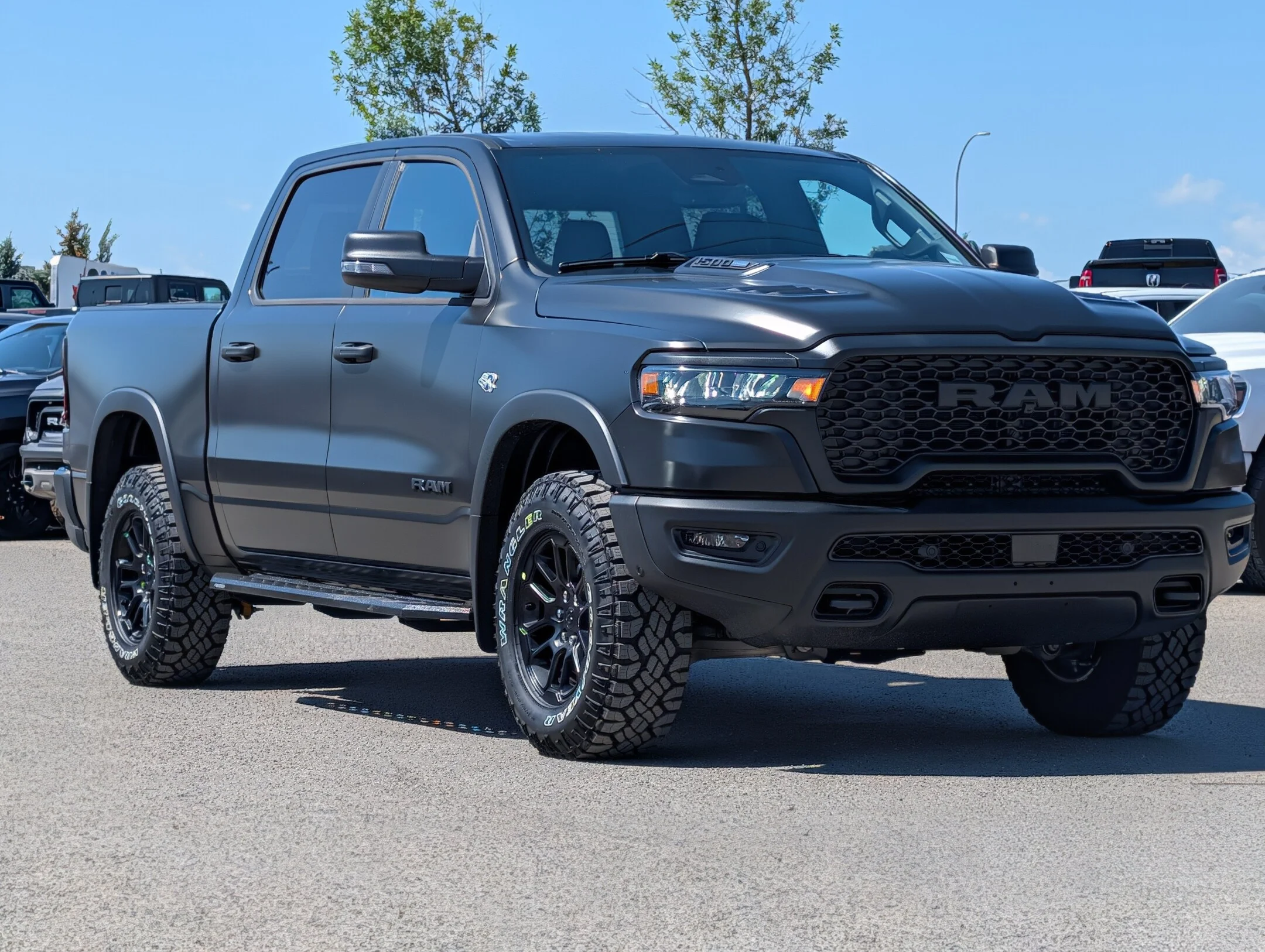 New 2026 Black RAM Rebel - - Satin Black Wrap - Window Tint - Running Boards - Tonneau Cover & More! image 2