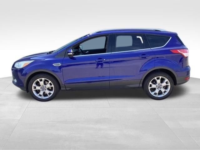 Used 2016 Blue Ford Titanium image 1