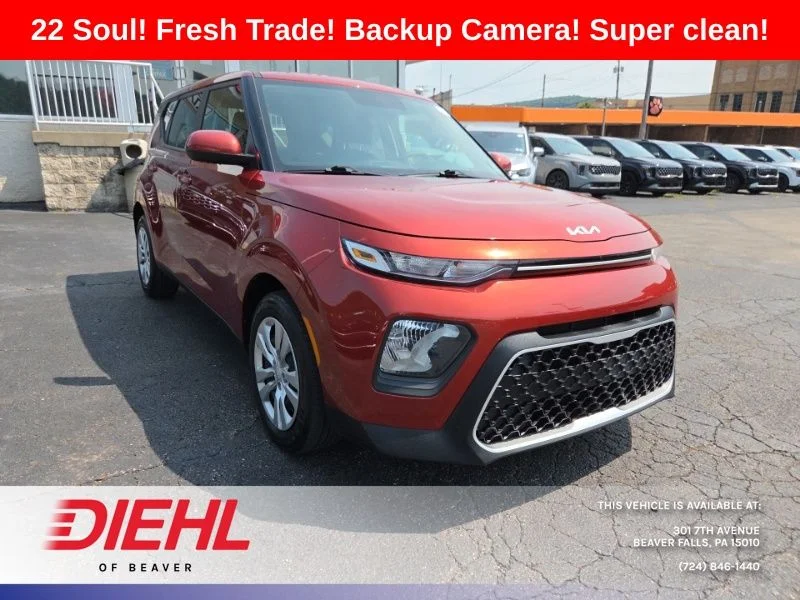 Used 2022 Orange Kia LX image 1
