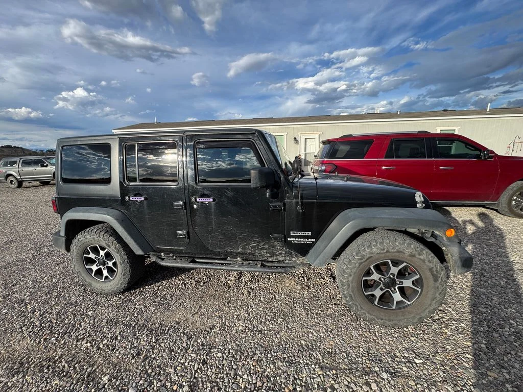Used 2014 Black Clearcoat Jeep Unlimited Sport image 21