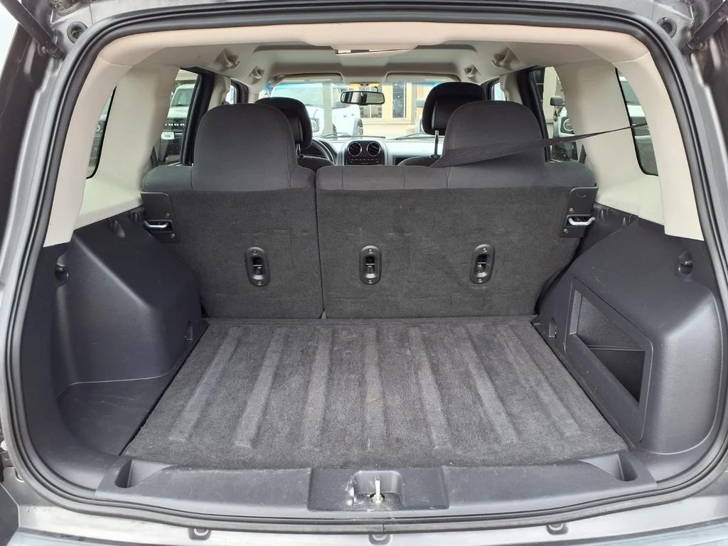Used 2014 Gray Jeep Sport image 22