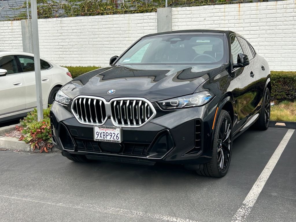 Used 2026 Black Sapphire Metallic BMW xDrive40i image 2
