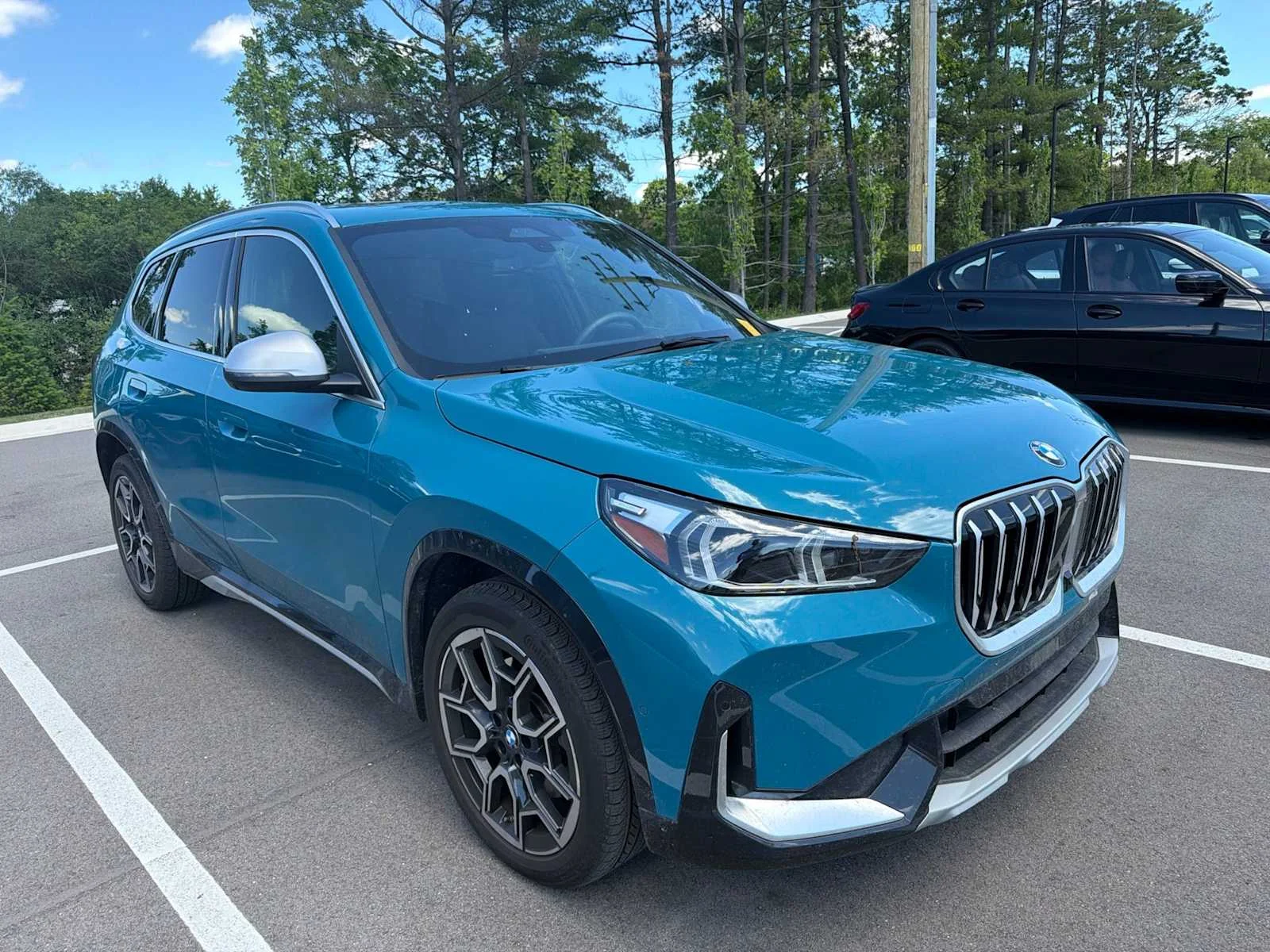 Certified Used 2023 Blue Bay Lagoon Metallic BMW xDrive28i image 3