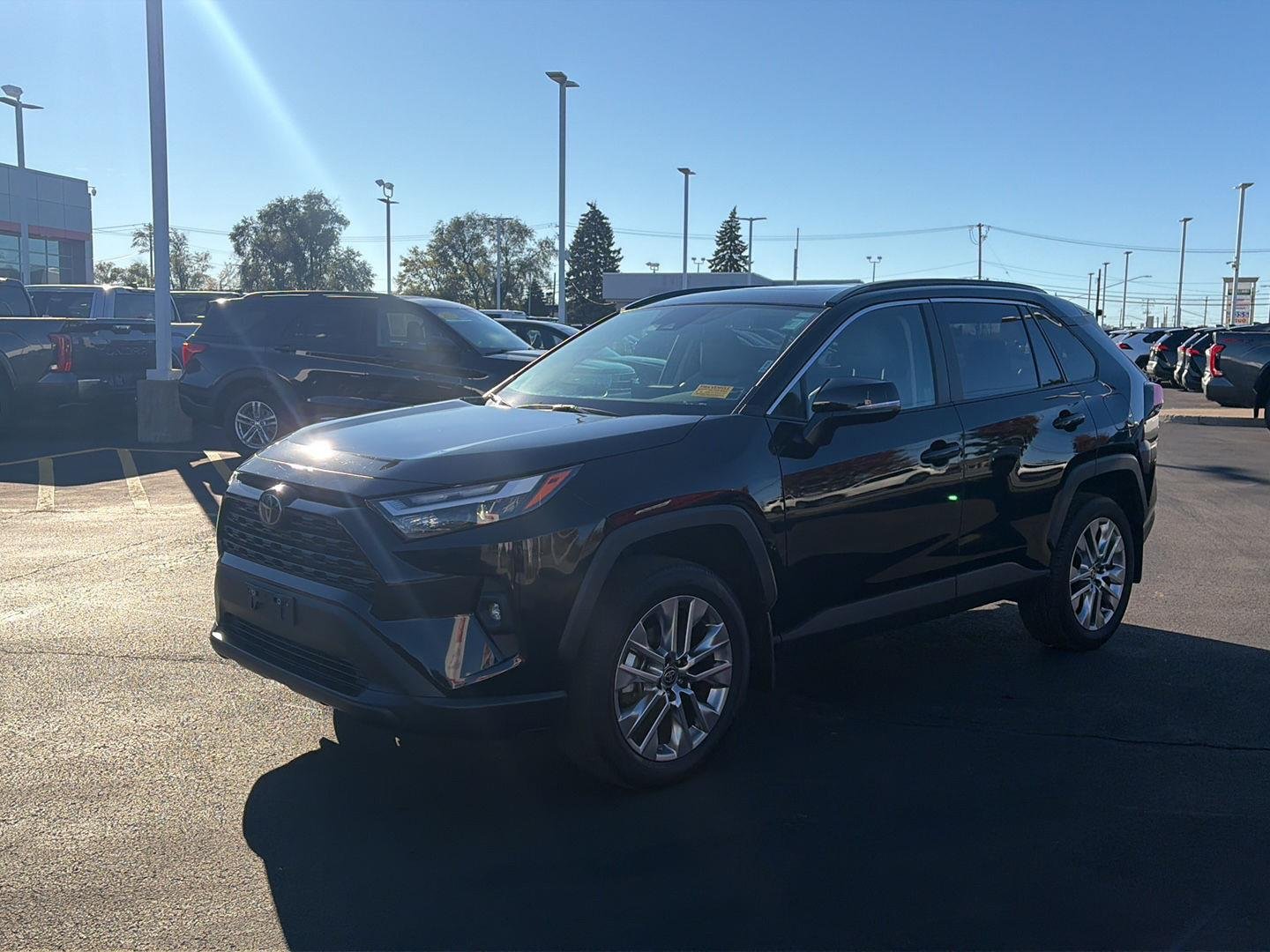 Used 2025 Midnight Black Metallic Toyota XLE Premium image 7