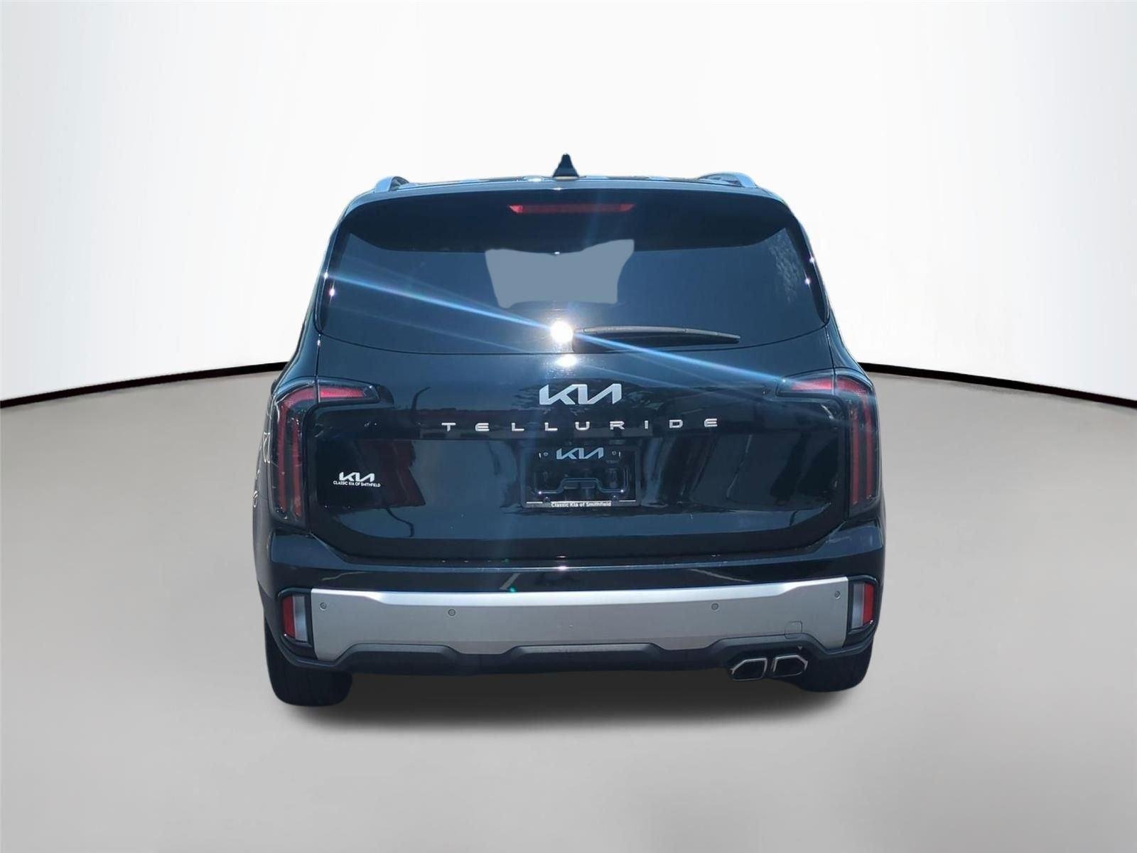 Used 2024 Ebony Black Kia EX image 12