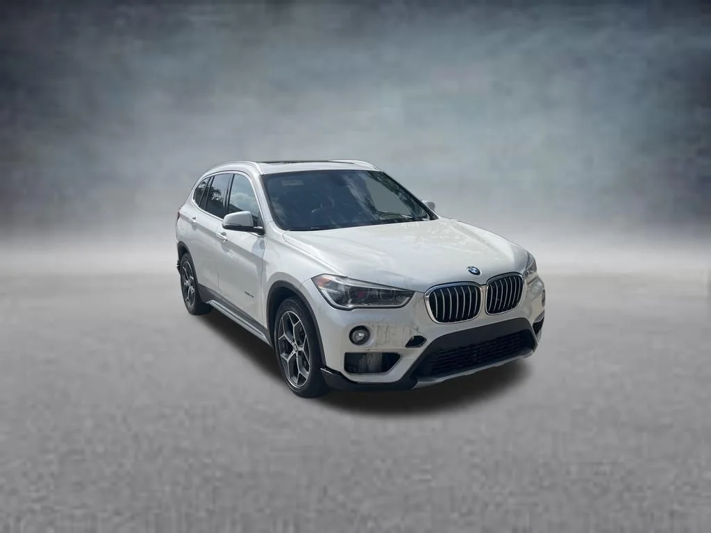 Used 2016 BMW X1 28i with VIN WBXHT3C30G5F65059 for sale in Fort Pierce, FL