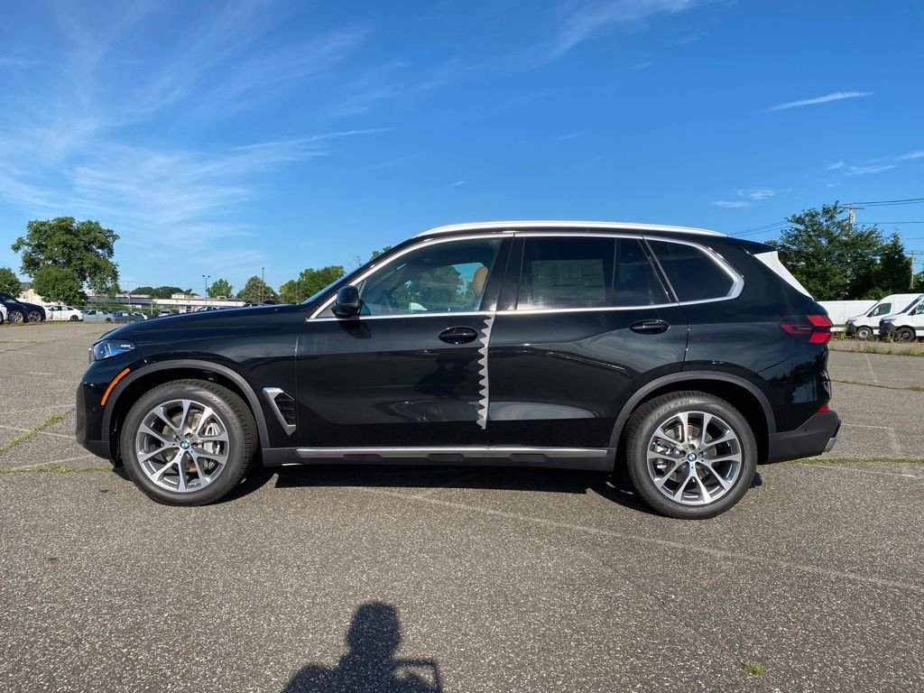 New 2026 Black Sapphire Metallic BMW xDrive40i image 4