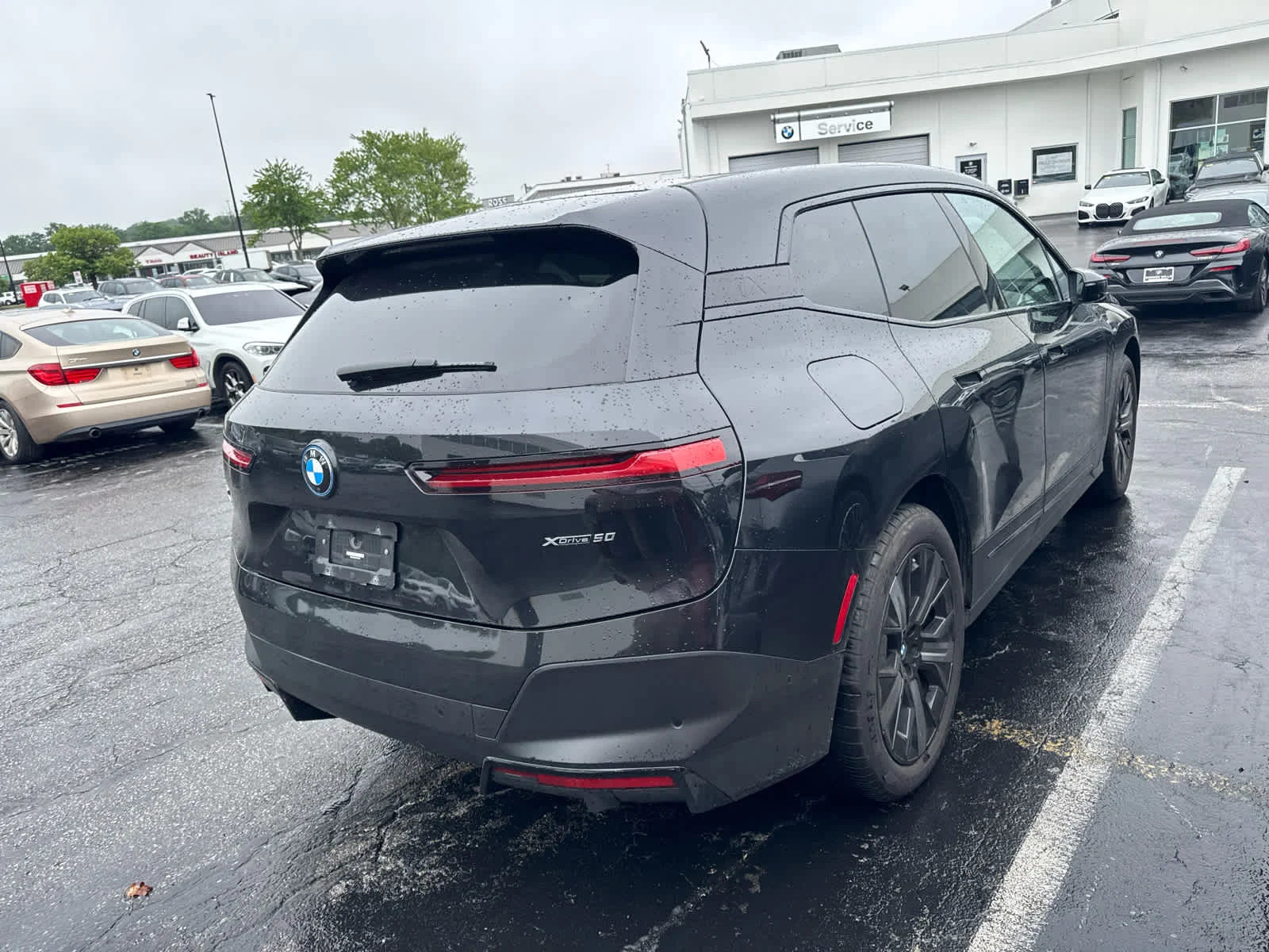 Certified Used 2024 Black Sapphire Metallic BMW xDrive50 image 7