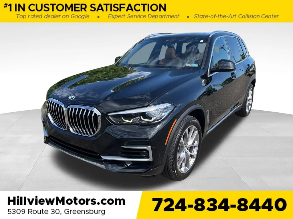 Certified Used 2022 Black Sapphire Metallic BMW xDrive40i image 1
