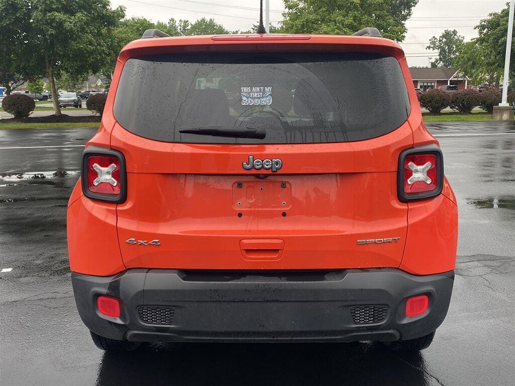 Used 2018 Omaha Orange Jeep Sport image 9
