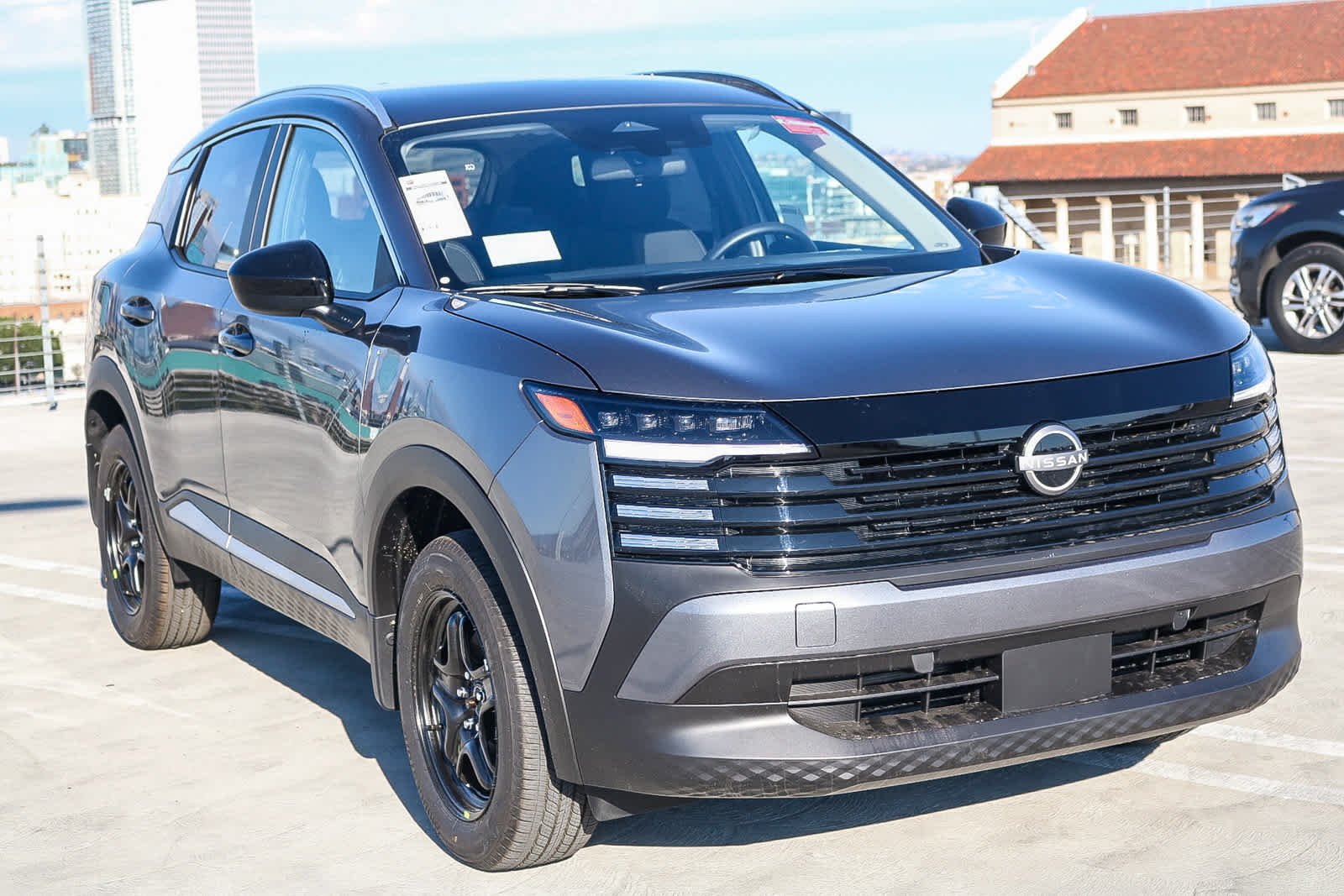 New 2026 Gun Metallic Nissan SV image 3
