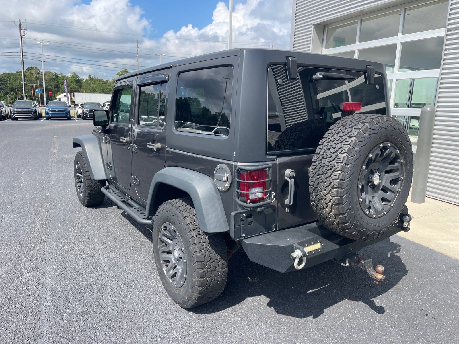 Used 2017 Granite Crystal Metallic Clear Coat Jeep Sport S image 12
