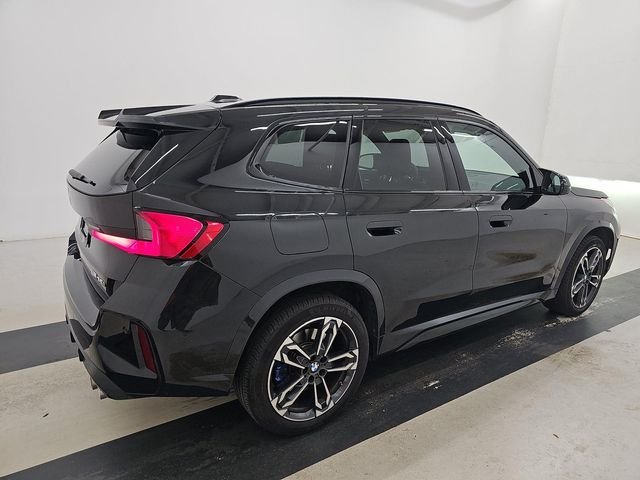 Used 2025 Black Sapphire Metallic BMW M35i image 11