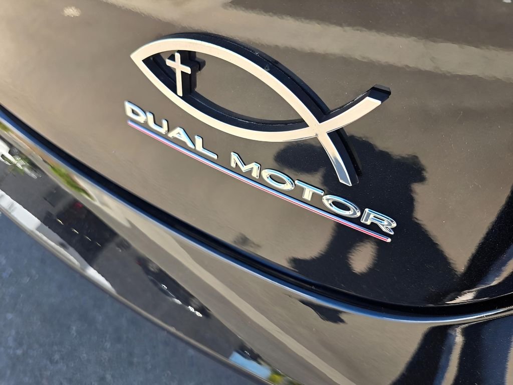 Used 2022 Solid Black Tesla Performance image 19