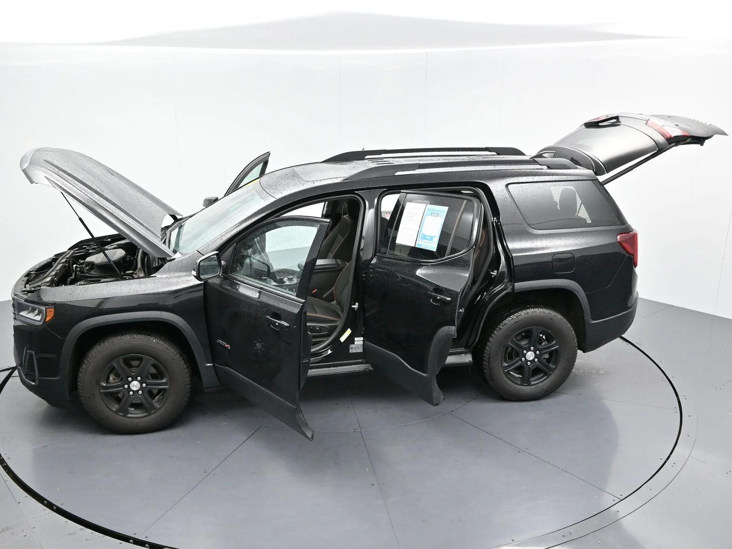Used 2023 Ebony Twilight Metallic GMC AT4 image 48