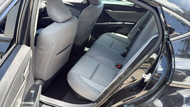 Used 2025 Midnight Black Metallic Toyota LE image 16
