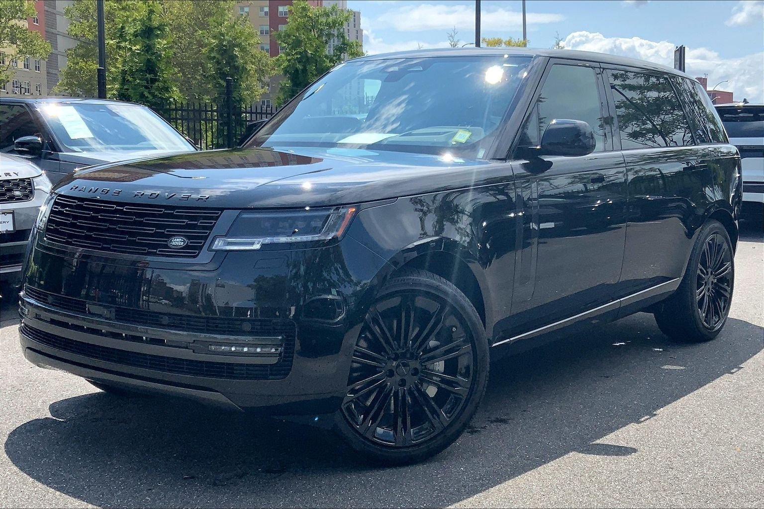New 2026 Santorini Black Land Rover SE LWB 7-Seats / V8 image 1