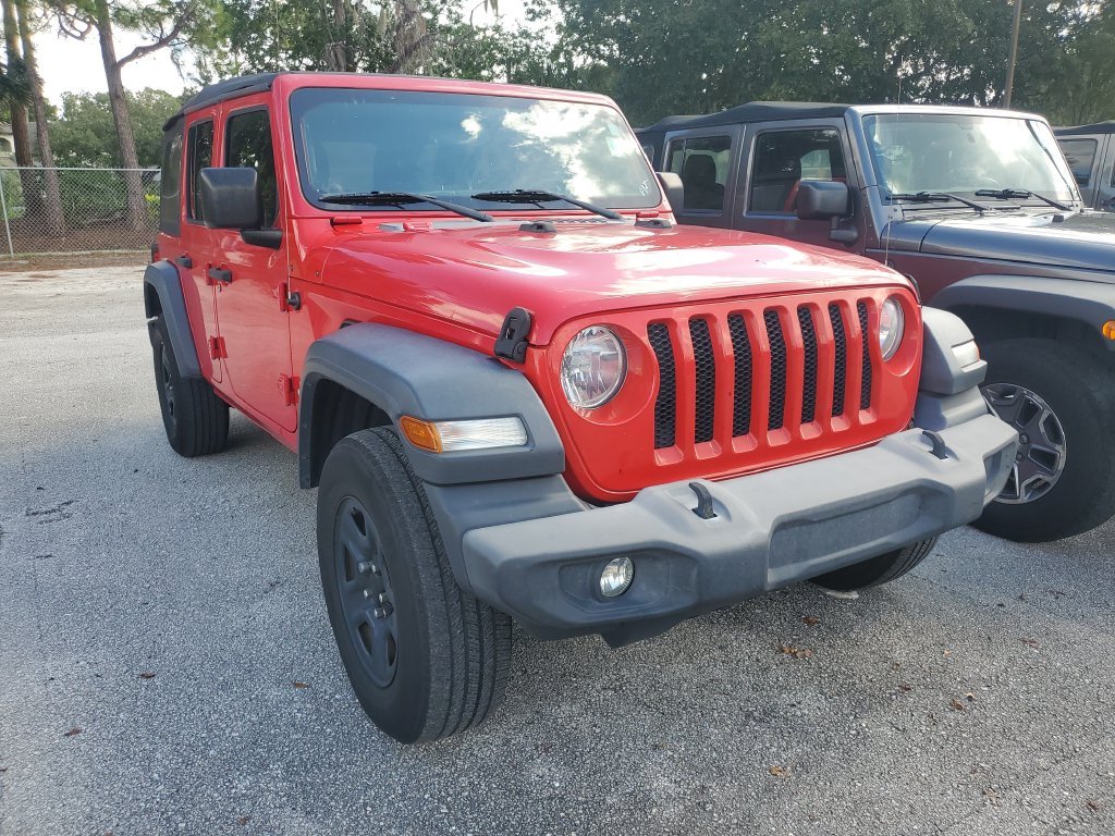 Used 2018 Red Jeep Unlimited Sport image 1