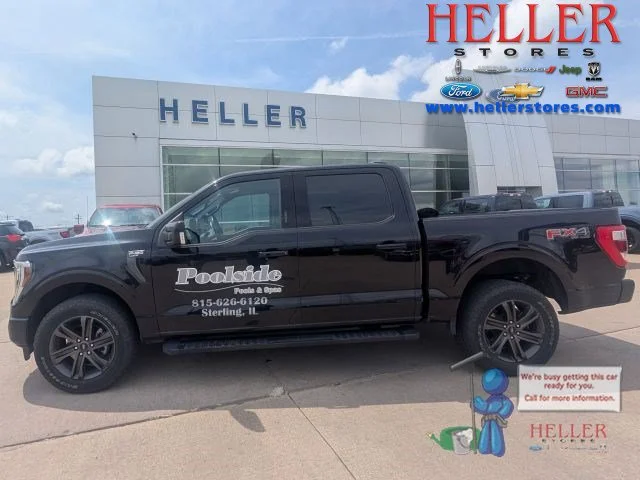 Used 2021 Agate Black Metallic Ford LARIAT image 1