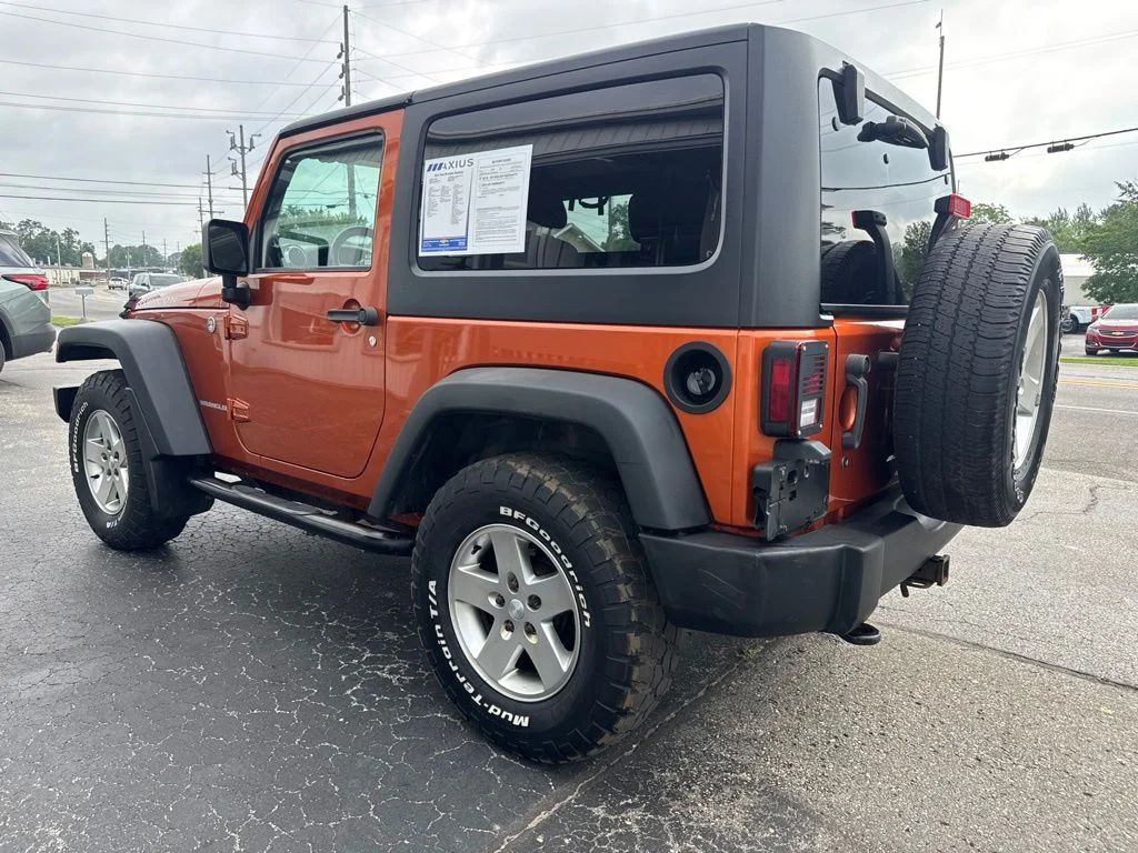 Used 2011 Orange Jeep Rubicon image 5